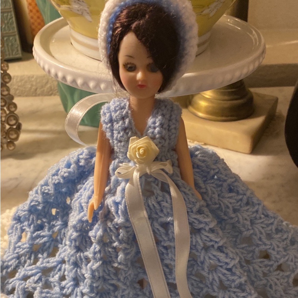 Vintage doll with crochet dress